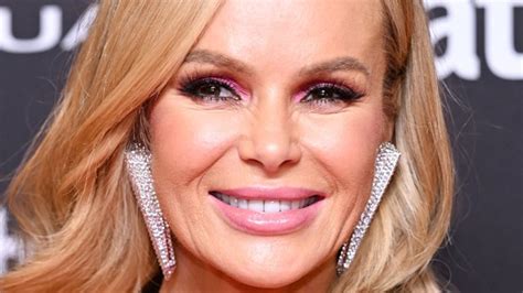 Amanda Holden almost bares all in topless shower video from。